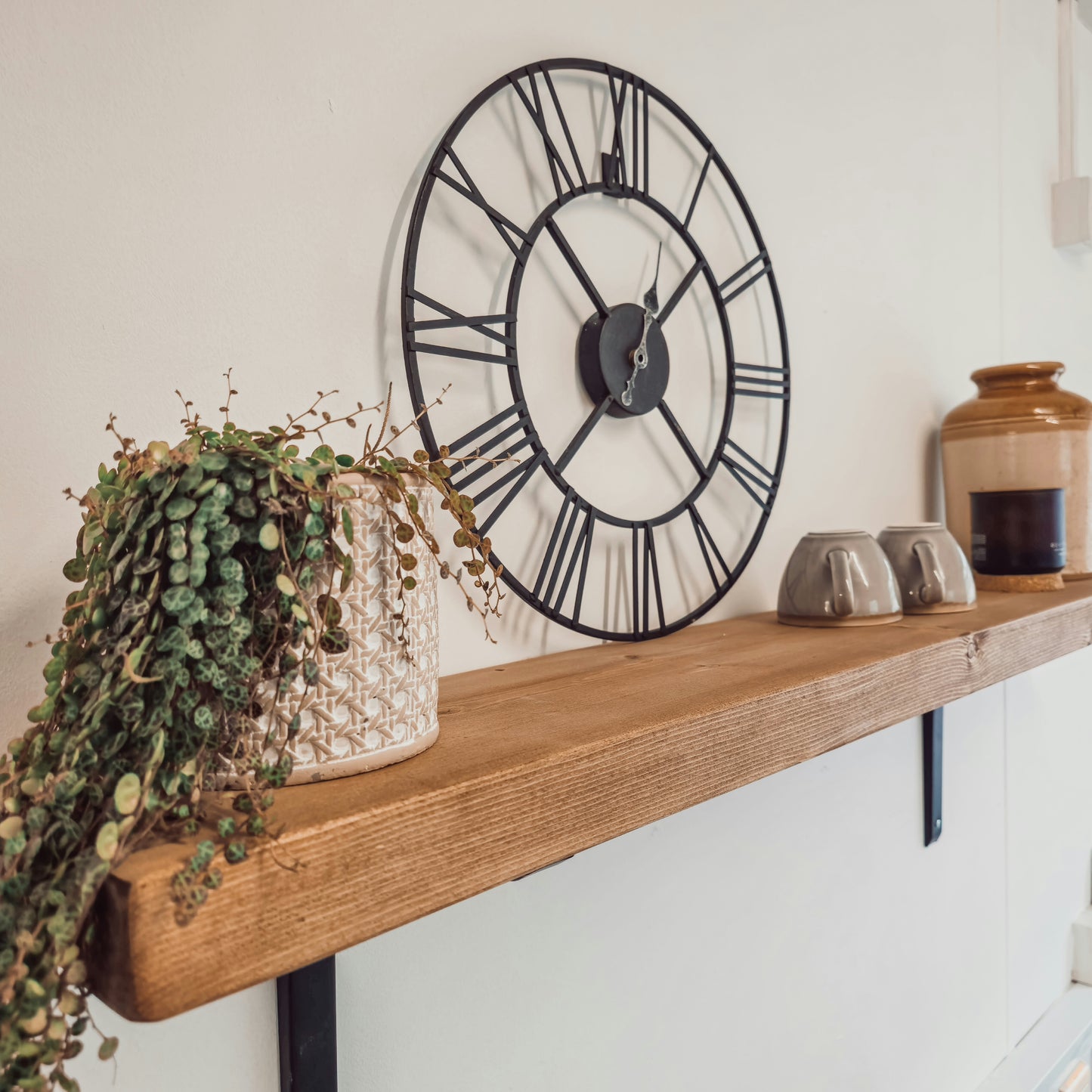 Rustic Wooden Shelf with Metal Brackets