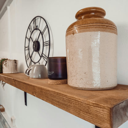 Rustic Wooden Shelf with Metal Brackets