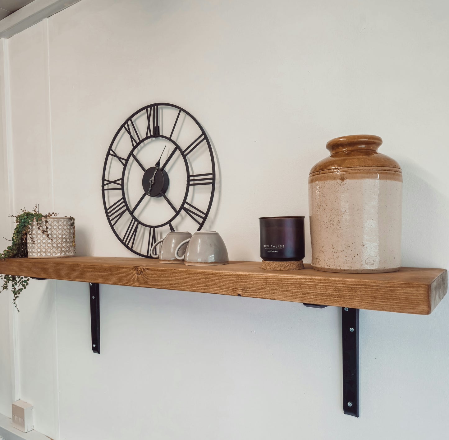 Rustic Wooden Shelf with Metal Brackets